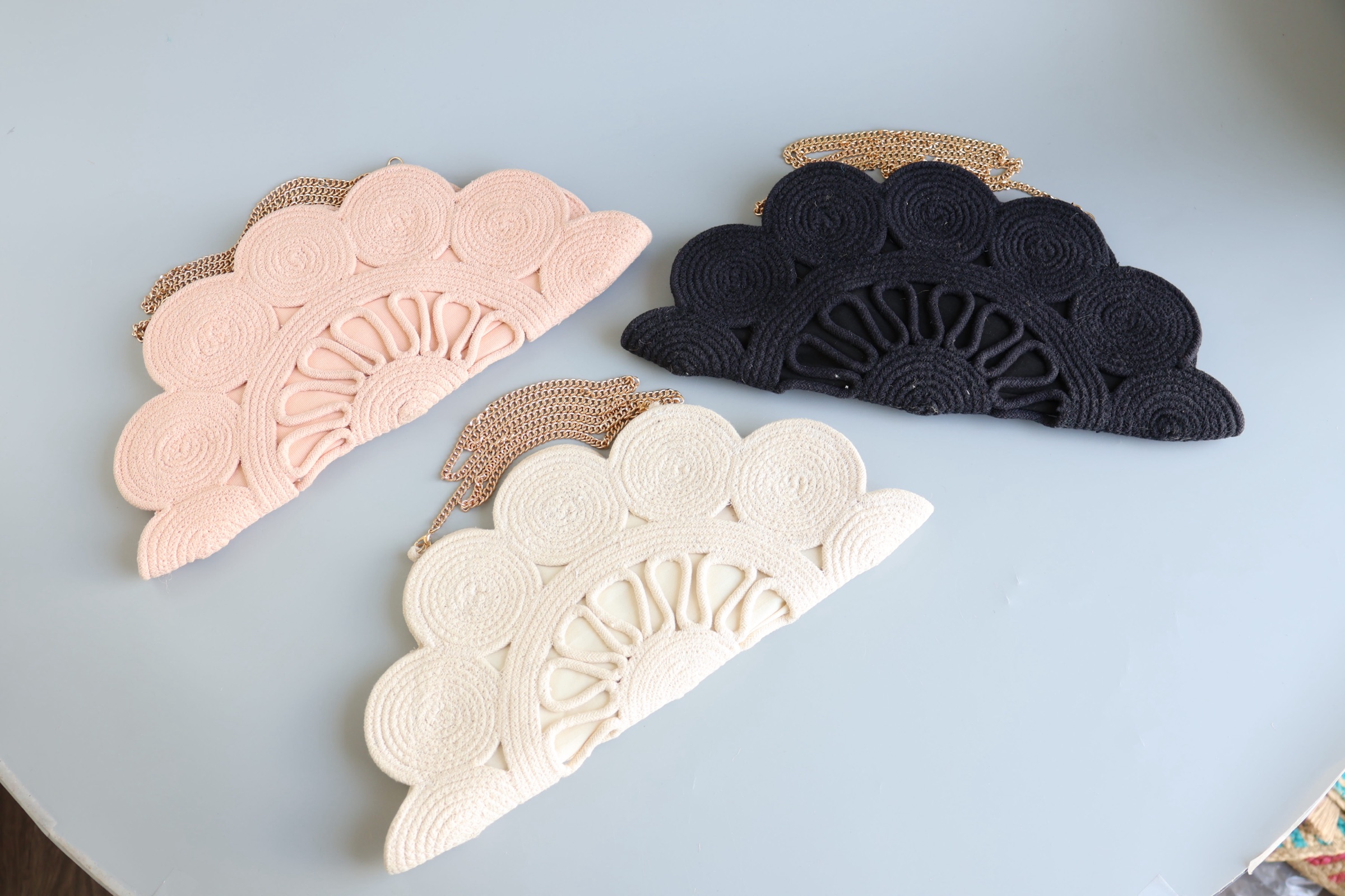 Three original Cora fan clutches