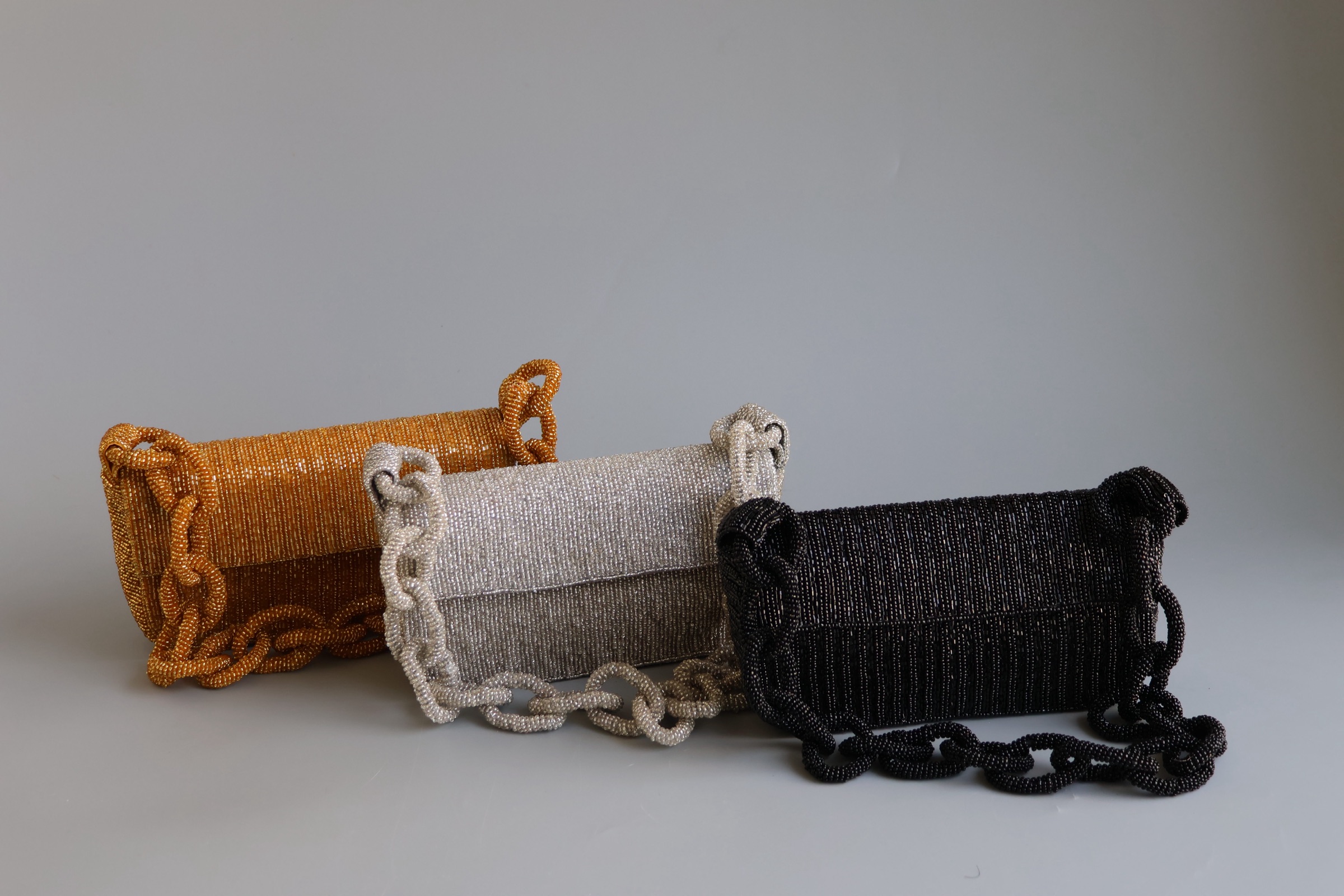 Three original metallic beaded chain bags